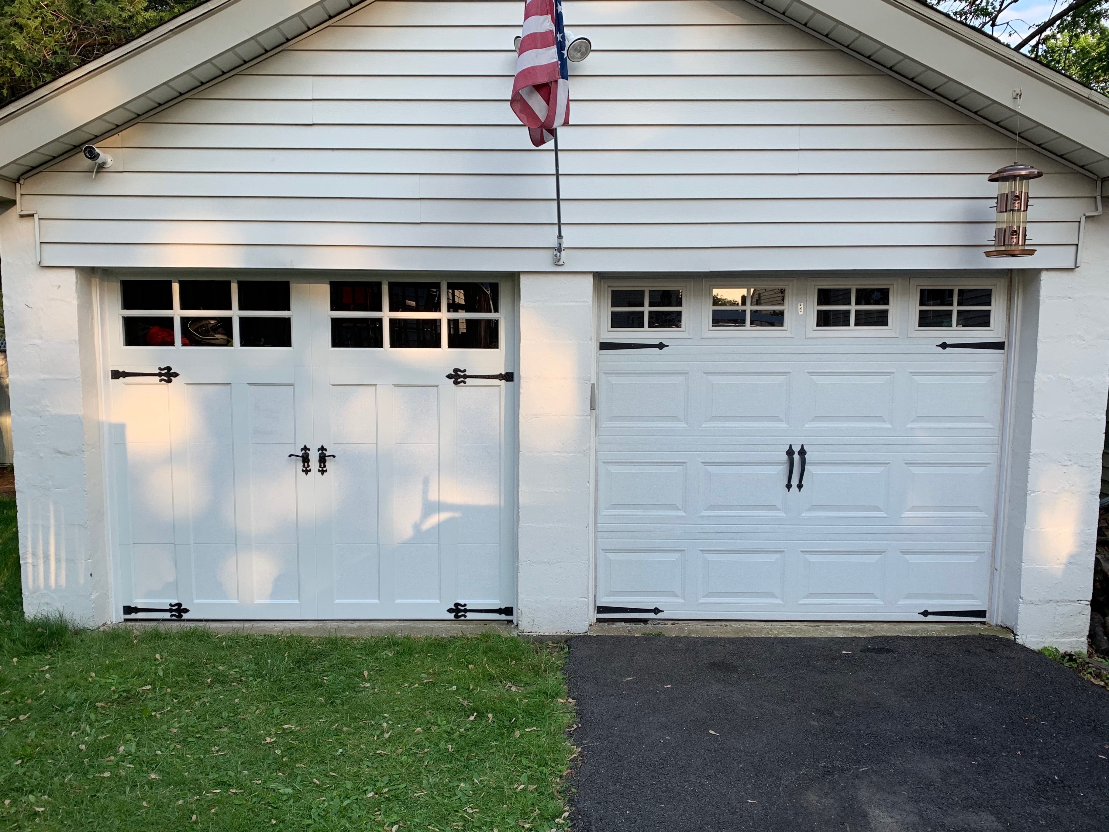 Garage door installation with American flag display - Eagle Overhead Door New Jersey